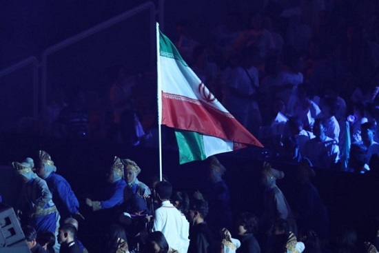 رژه کاروان ایران به پرچم‌دارى الهه احمدى+عکس