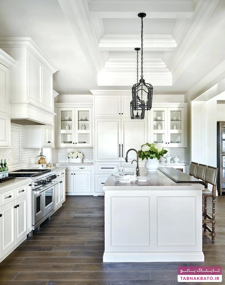 آشپزخانه‌ای مینمال با کابینت‌های سفید