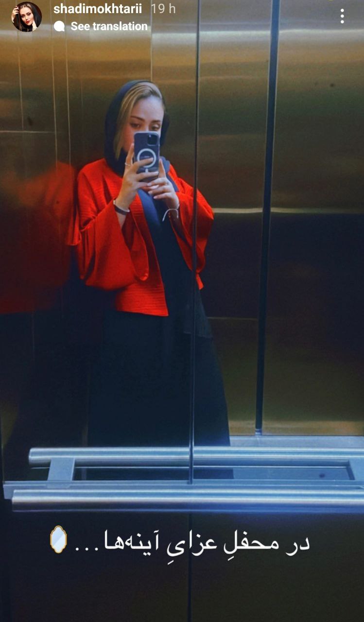 عکس آسانسوری خانم بازیگر با یک پیراهن قرمز