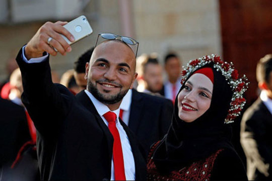 مراسم عروسی زوج فلسطینی در کرانه