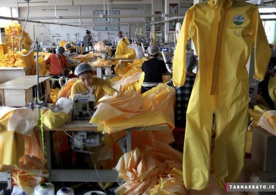 تولید لباس ایمنی در کارخانه صنایع لیکلند در شهر ویفانگ استان شاندونگ در کشور چین