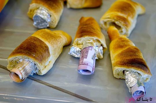 پول های جاسازی شده درون نان شیرینی , قاچاق کالا