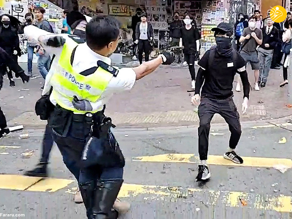 شلیک پلیس هنگ کنگ به یک معترض از فاصله نزدیک + عکس