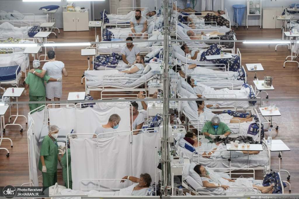 بیماران کرونایی روی تختهای بیمارستان صحرایی + عکس