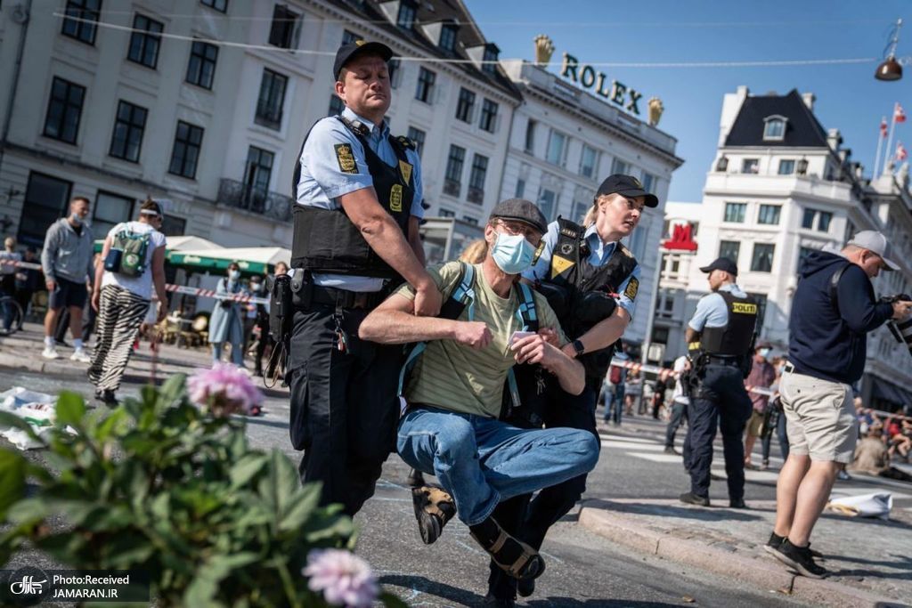 درگیری پلیس دانمارک با فعالان محیط زیستی + عکس
