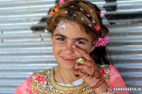 دختری در لباس عید، عراق، موصل